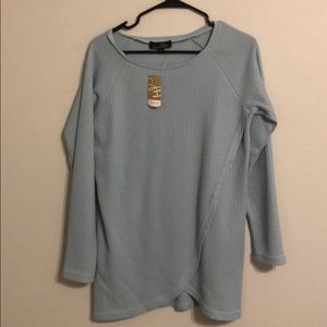 bluish seafoam colored top